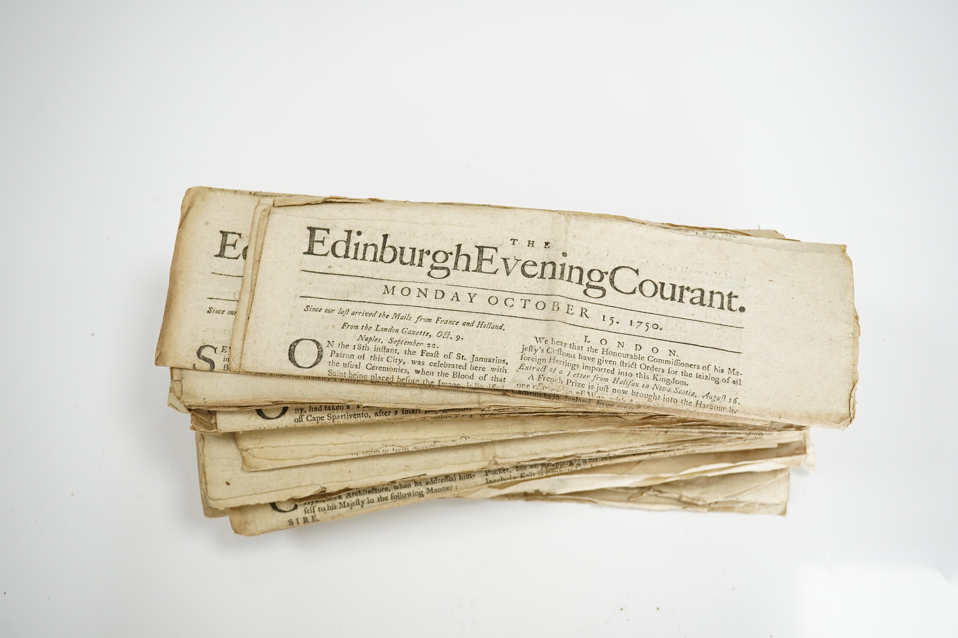 The Edinburgh Evening Courant - 52 various issues, 1742-52. small broadsheet of 4pp. with double column printing; uniformly folded across to 'docket' size (7 x 22cm) Edinburgh: printed for R. Fleming and Company, 1742-52